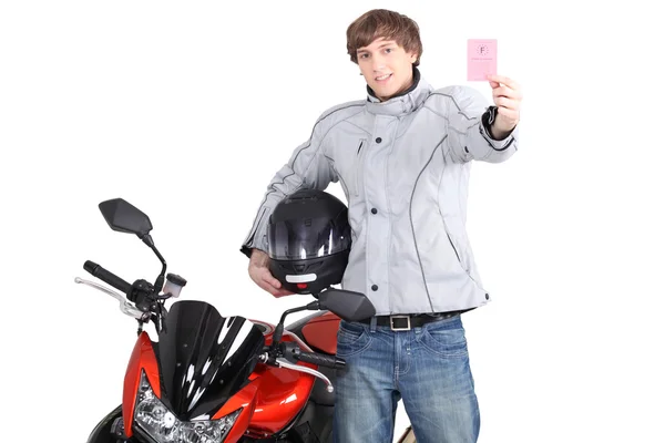 Mladý člověk s licencí k motorce — Stock fotografie