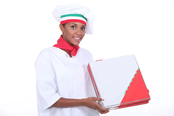 Chef de pizza con una caja para llevar —  Fotos de Stock