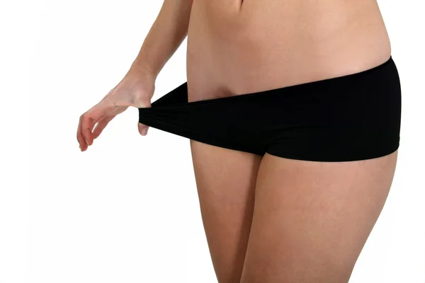 Kadın kilo kaybettikten sonra siyah külot — Stok fotoğraf