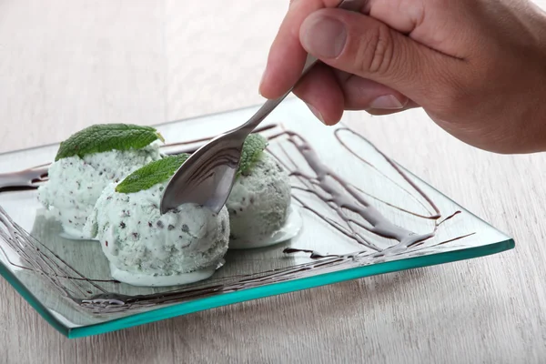Eating mint icecream. — Stock Photo, Image