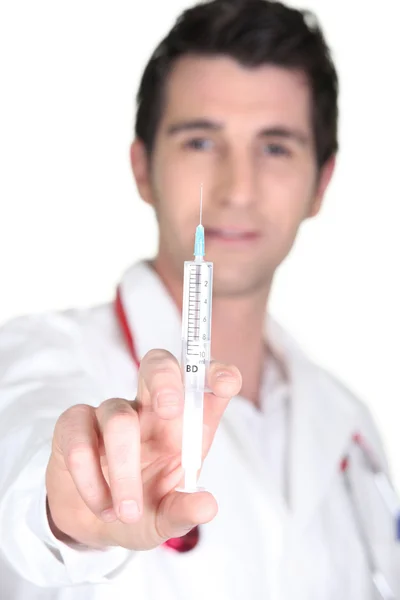 Doctor with an hypodermic needle — Stock Photo, Image