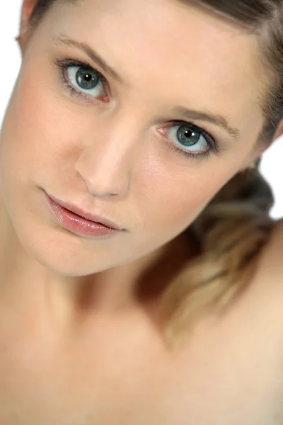 Close-up van vrouw in studio — Stockfoto