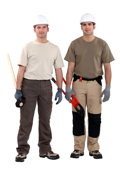 Hantverkare poserar tillsammans — Stockfoto