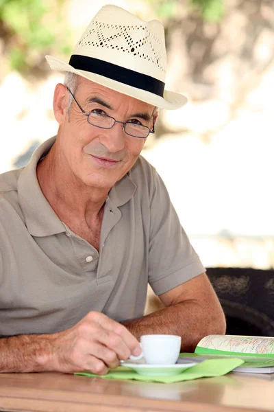Senior man with an expresso — Stock Photo, Image