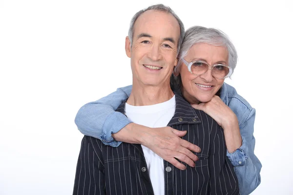 Couple of pensioners looking happy — Stock Photo, Image