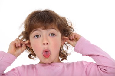 Young girl making a funny face clipart