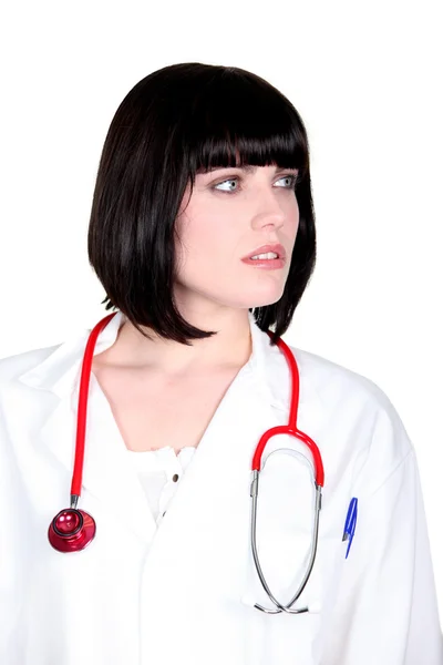 En läkare blick i sidled — Stockfoto