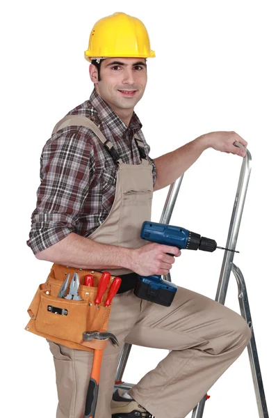 Man standing on ladder — Stock Photo, Image
