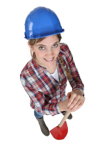 Kvinna anläggning spade — Stockfoto