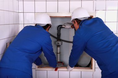 Installation of plumbing clipart