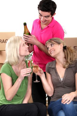 Young celebrating on moving day clipart