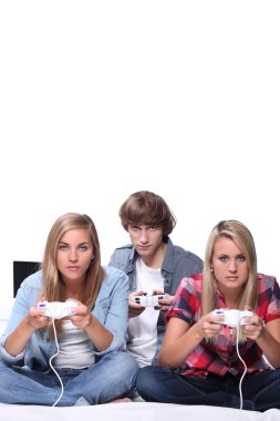 Teenagers playing computer games clipart