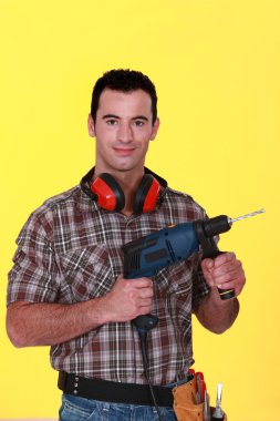 Man with drill clipart