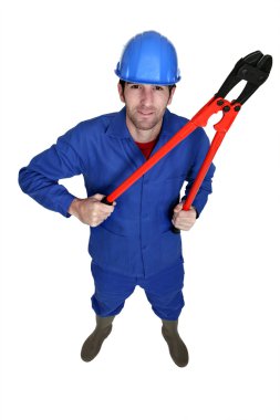 Man using bolt-cutters clipart