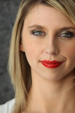 Head-shot of blond woman wearing red-lipstick clipart