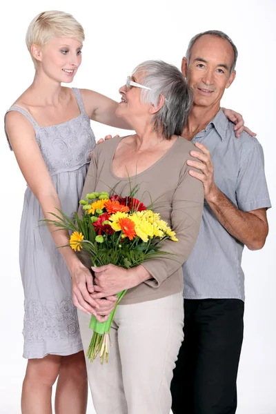 Mother with flowers — Stock Photo, Image