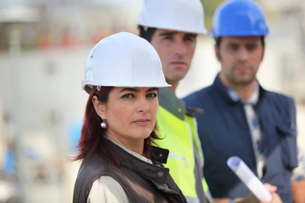 Construction team on site — Stock Photo, Image
