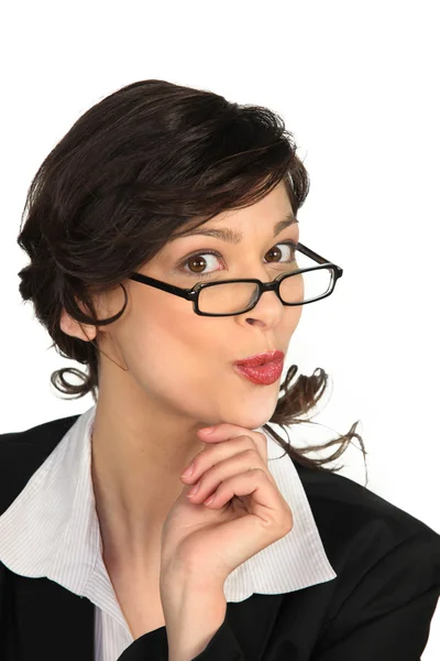 Empresária em óculos amuado bochechento — Fotografia de Stock