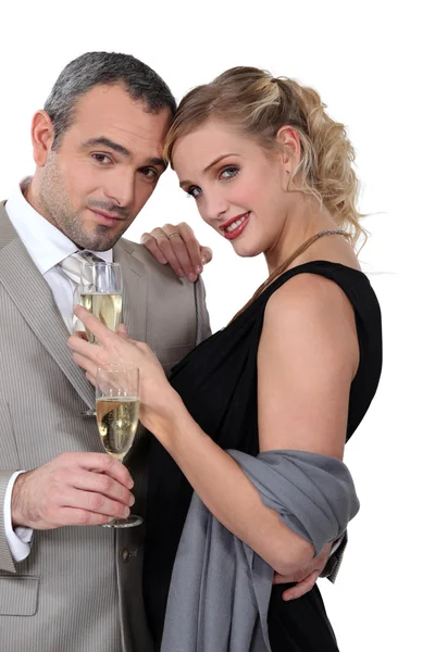 Couple with champagne — Stock Photo, Image