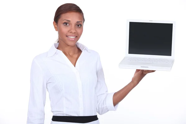 Waitress with computer in hand — Stock Photo, Image