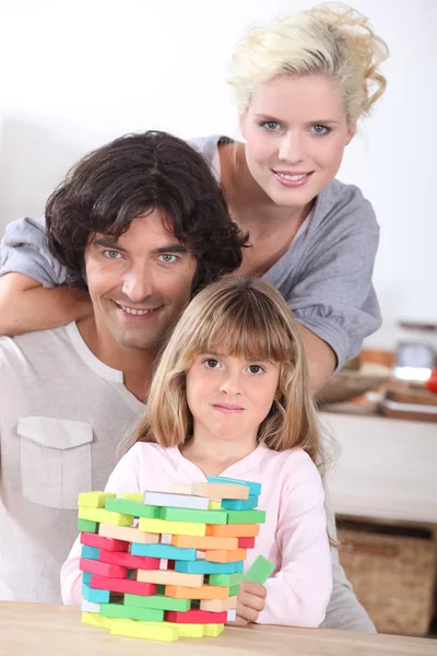 Famiglia con puzzle — Foto Stock