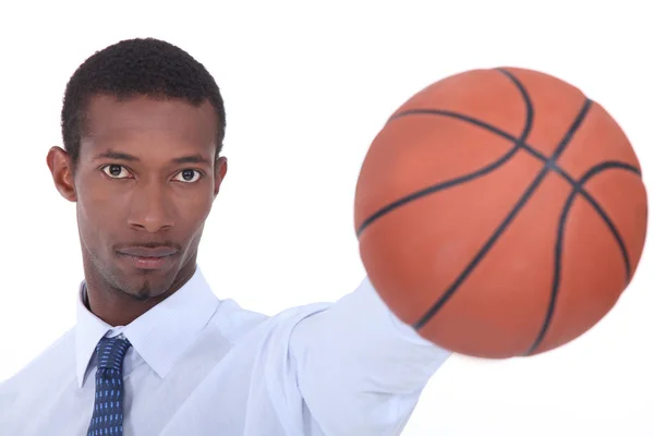 stock image Man holding basketball