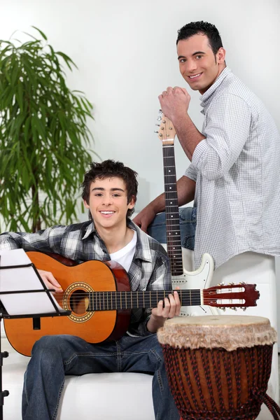 Father and son in music rehearsal — Stock Photo, Image