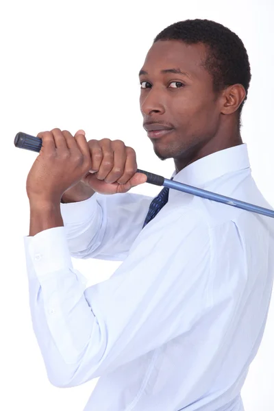 Businessman holding golf-club — Stock Photo, Image