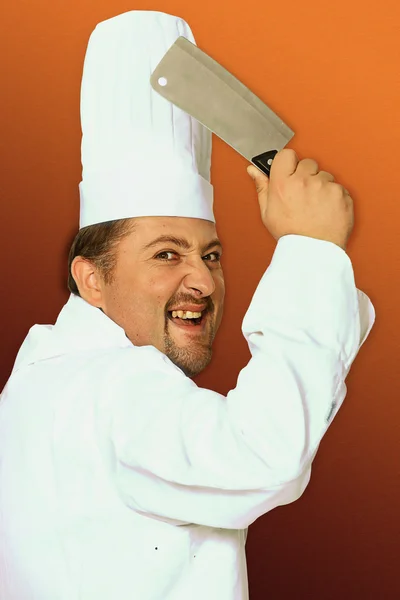Menacing butcher holding meat cleaver — Stock Photo, Image