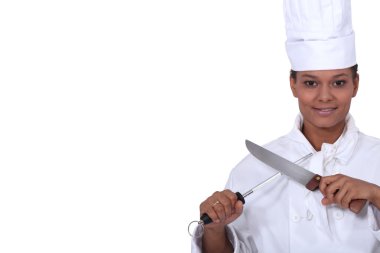 Woman with a kitchen knife clipart