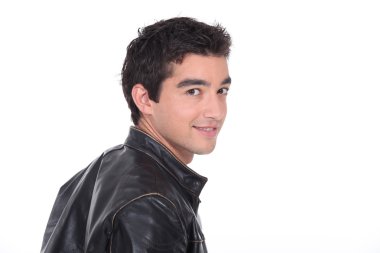 Young man in a leather jacket clipart