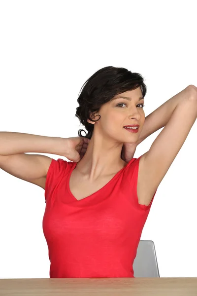 Brunette woman stretching — Stock Photo, Image