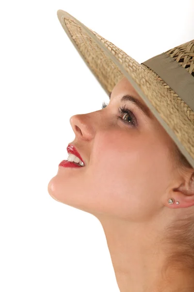 Perfil de uma mulher em um chapéu de palha — Fotografia de Stock