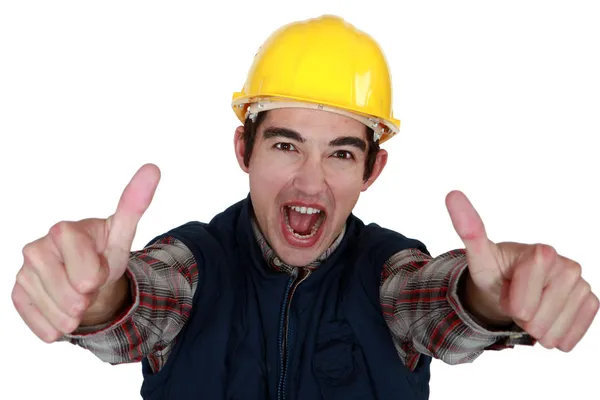 Builder giving thumbs-up gesture — Stock Photo, Image