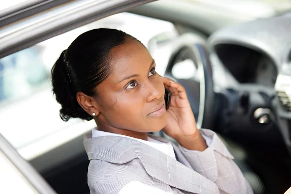 stock image Businesswoman making a call whilst in parked car