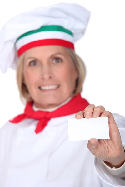 Italský šéfkuchař s Prázdná vizitka — Stock fotografie