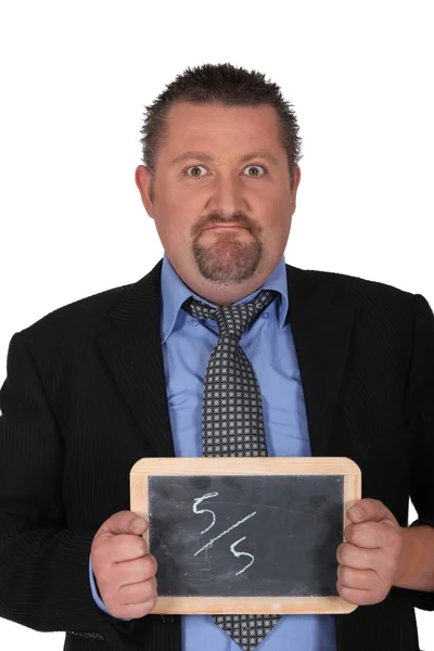 Businessman showing slate on white background Stock Photo