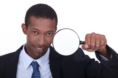 Portrait of a man with magnifying glass clipart