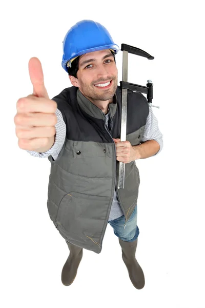 High angle shot of builder with thumb up — Stock Photo, Image