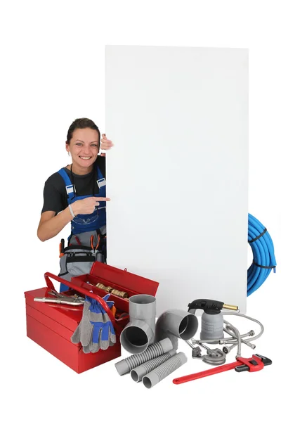 Plumber woman showing message — Stock Photo, Image