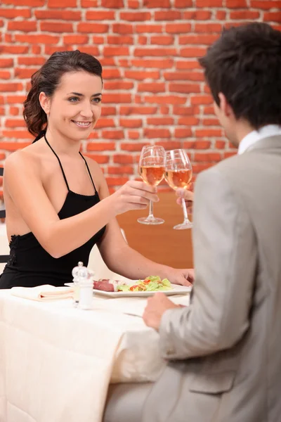 Couple in a restaurant — Stock Photo, Image