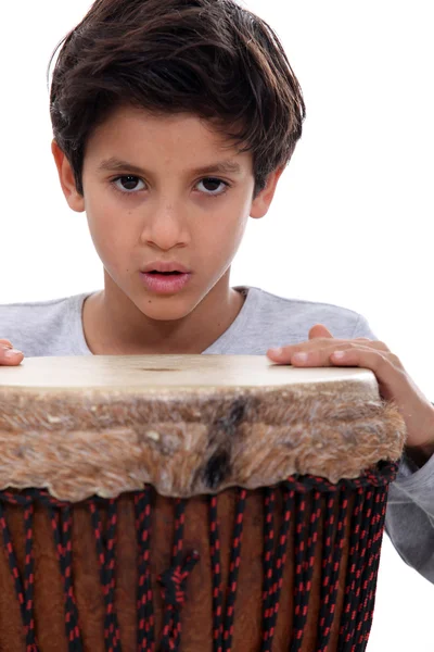 Boy with a djembe drum — Stock Photo, Image