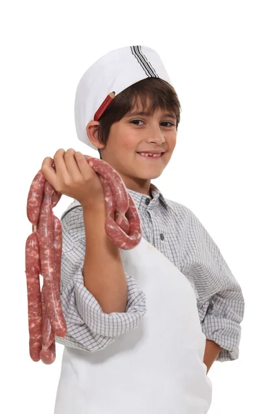 Child with sausage — Stock Photo, Image