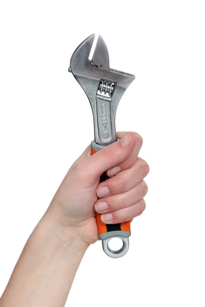 Mão segurando uma chave inglesa — Fotografia de Stock