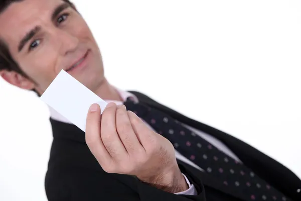 Man holding up a blank card — Stock Photo, Image