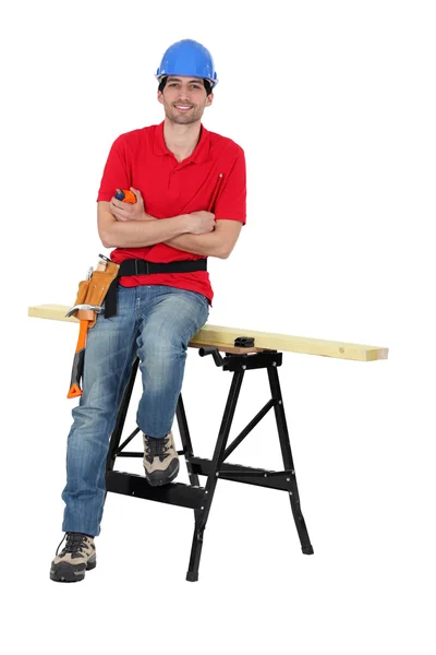 Mužské carpenter pózuje — Stock fotografie