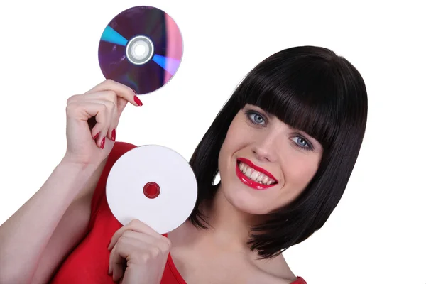 Woman holding digital storage discs — Stock Photo, Image