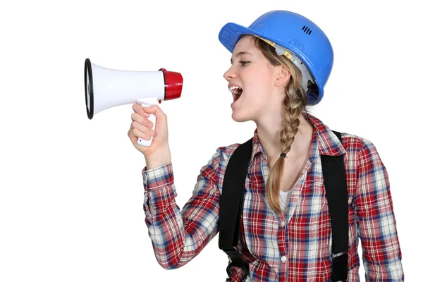 Woman laborer screaming in a bullhorn — Stock Photo, Image