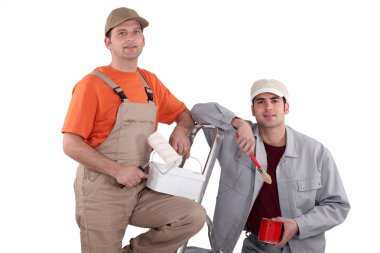 Two painters at work. clipart