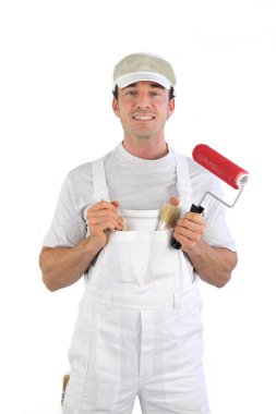 Decorator with a paint roller clipart